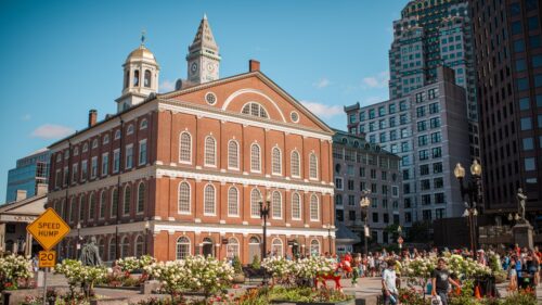 Family exploring Boston National Historical Park along the Freedom Trail
