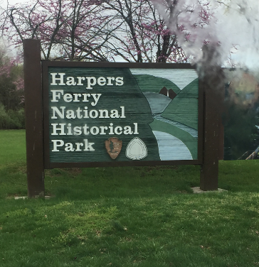 CapeRvTravelers family at the Harpers Ferry National Historical Park sign